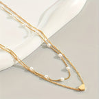 Double Necklace With Pearls And Heart Pendant